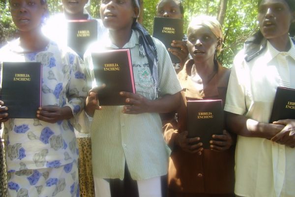 milka-from-left-lucy-and-others-with-new-bibles5410A054-0B75-56B0-491A-7FF046F8D42B.jpg